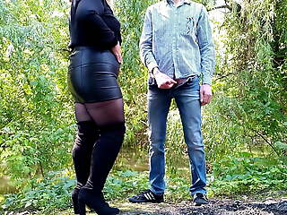 MILF in leather skirt gets a ton on her ass outdoors
