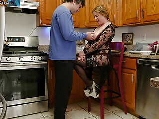 Stepmom taking stepson's cock in the kitchen for breakfast